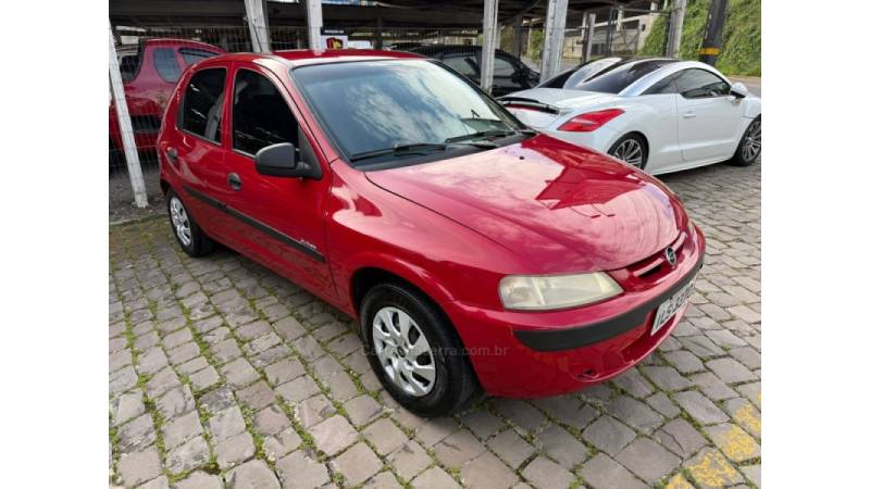 CHEVROLET - CELTA - 2004/2004 - Vermelha - R$ 21.900,00